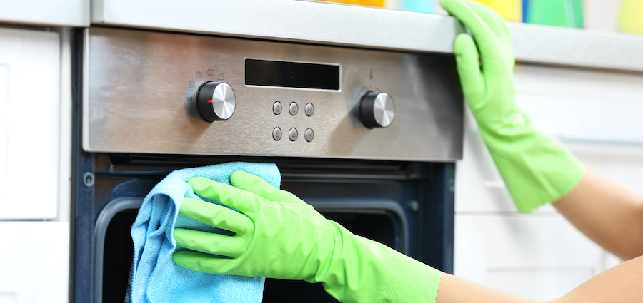 Cleaner cleaning an oven